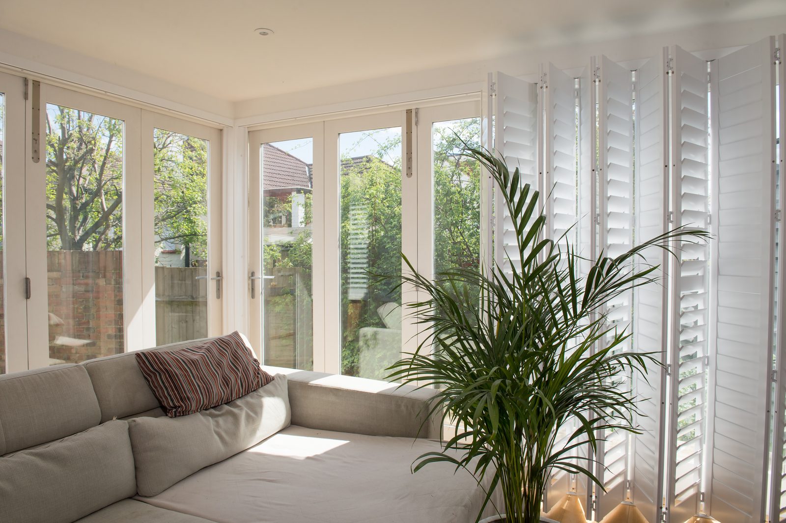 Conservatory shutters fitted in an Ipswich garden room