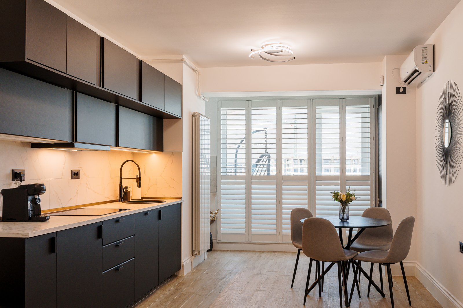 Plantation shutters above a kitchen sink in Ipswich