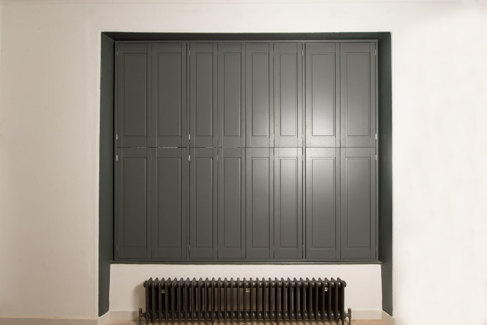 Solid panel shutters in an Ipswich hallway