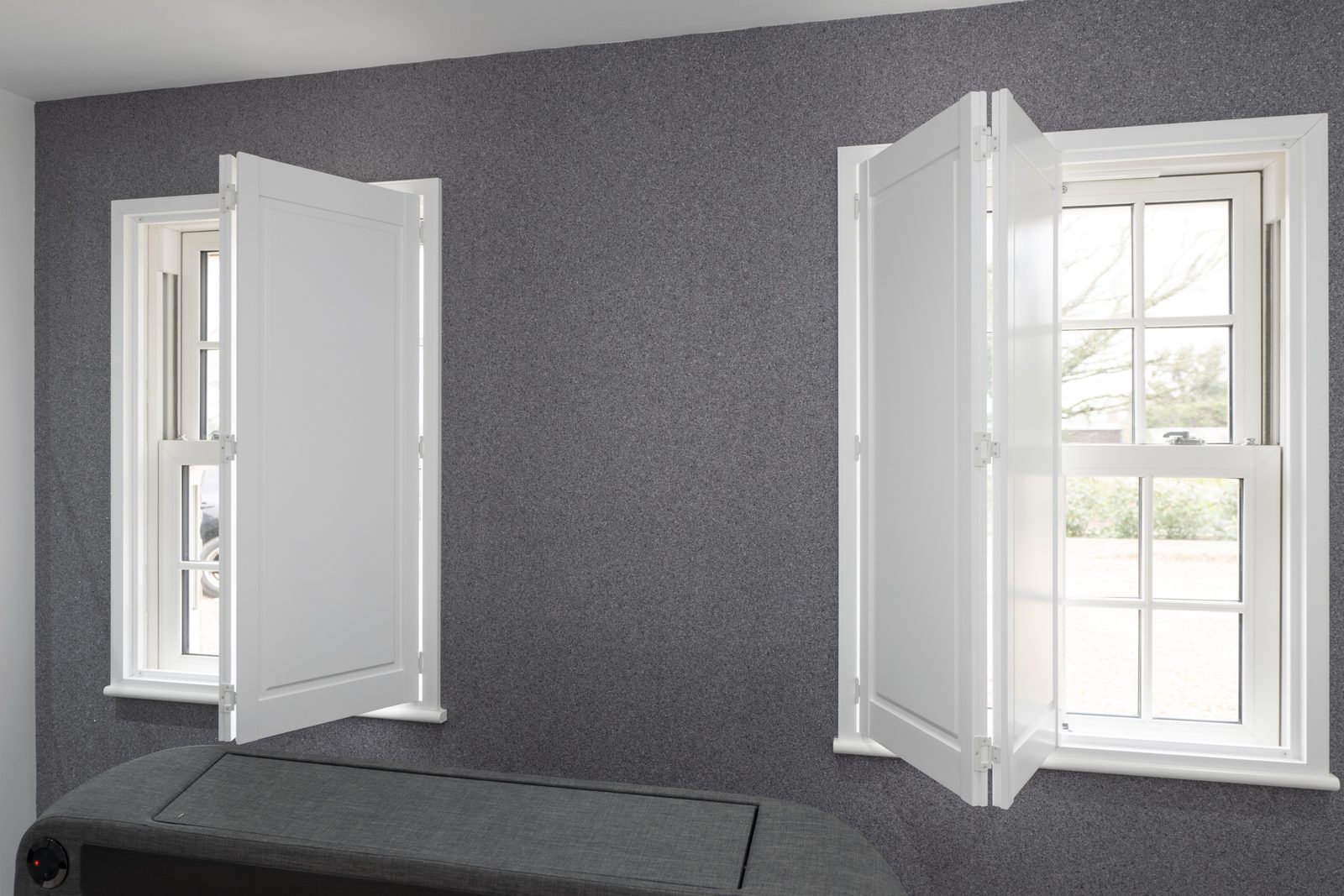 Solid panel shutters in a Felixstowe bedroom
