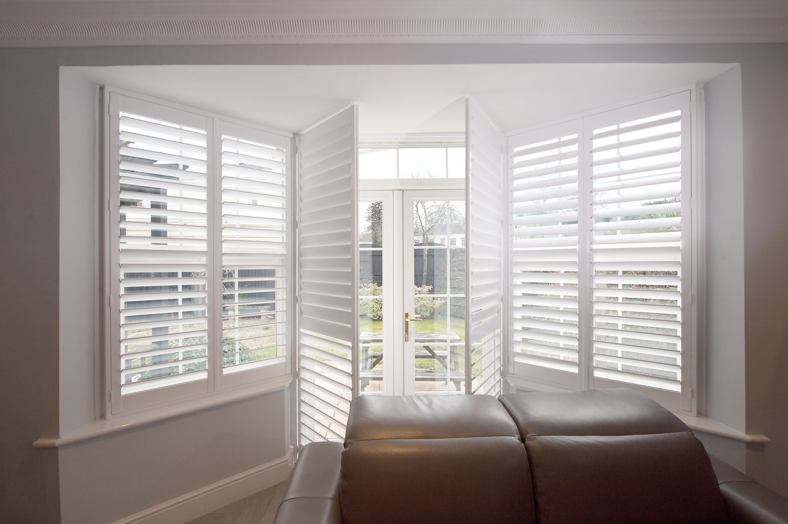 Mimeo composite shutters fitted to a bay window in an Ipswich home