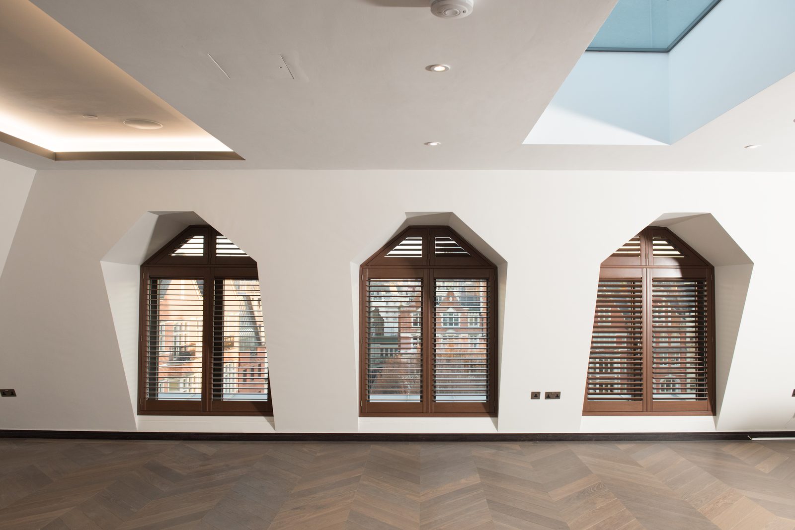 Arched window shutters fitted in an Ipswich home